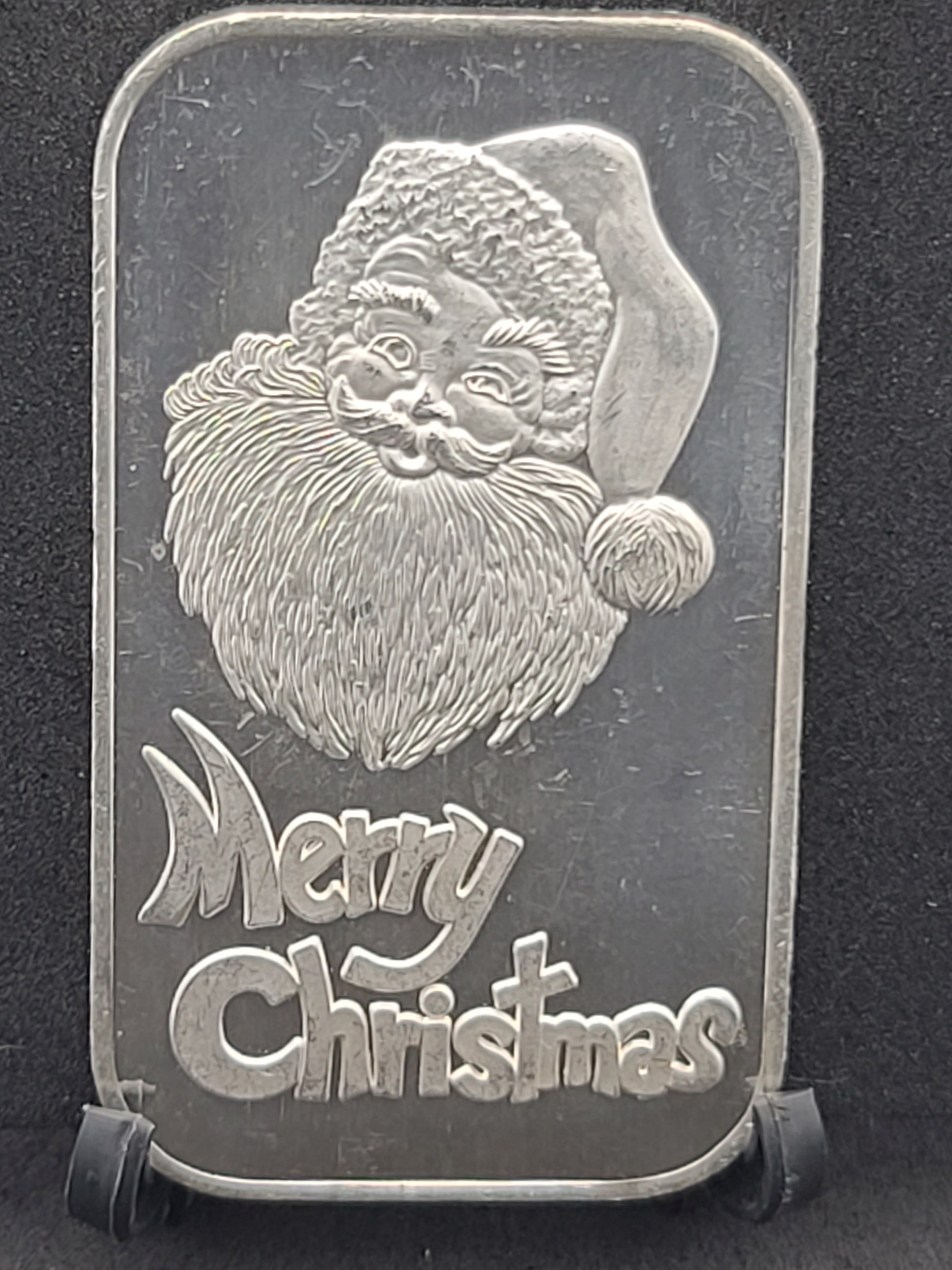 1987 Silver Towne Merry Christmas Santa Face Silver Art Bar